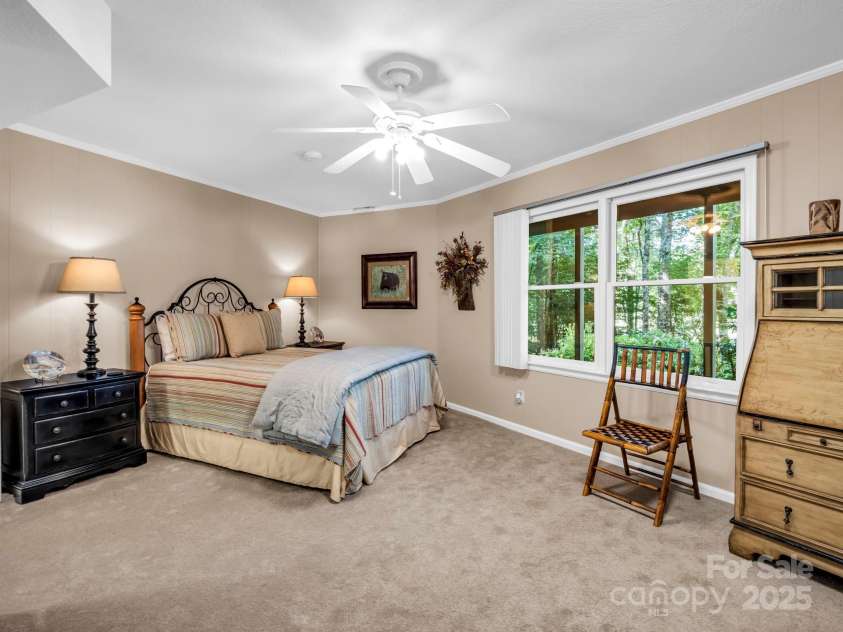 193 Downing Place, Lake Lure, NC 28746.  MLS# CAR4280208, YatesRealty ID 4203. Third additional guest room in the finished walk-out basement.