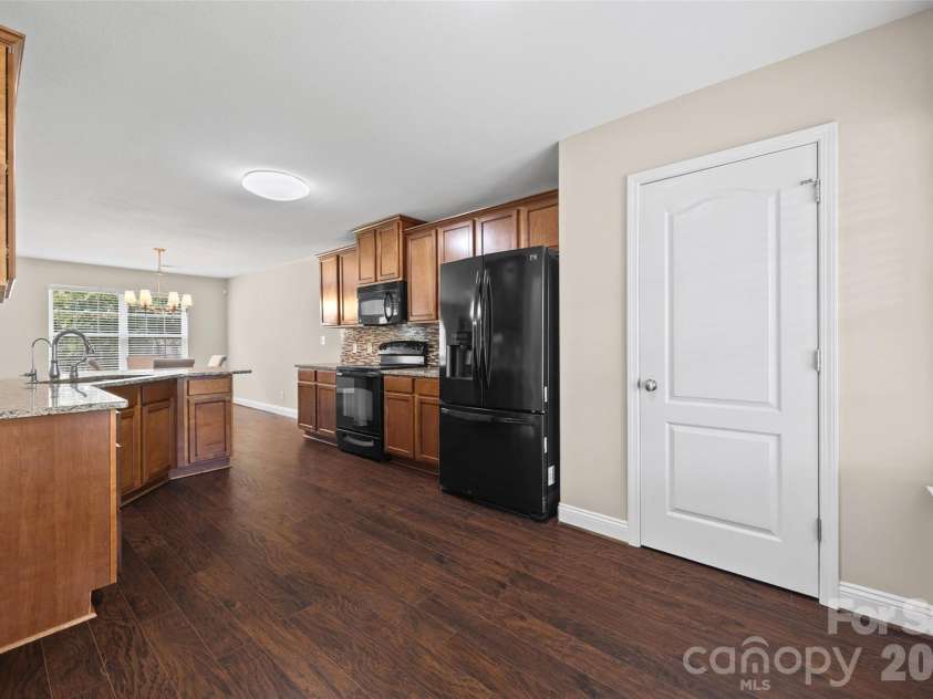 848 Estuary Court, Rock Hill, SC 29732.  MLS# CAR4411233, YatesRealty ID 42038. Premium granite countertops, and a full tile backsplash.