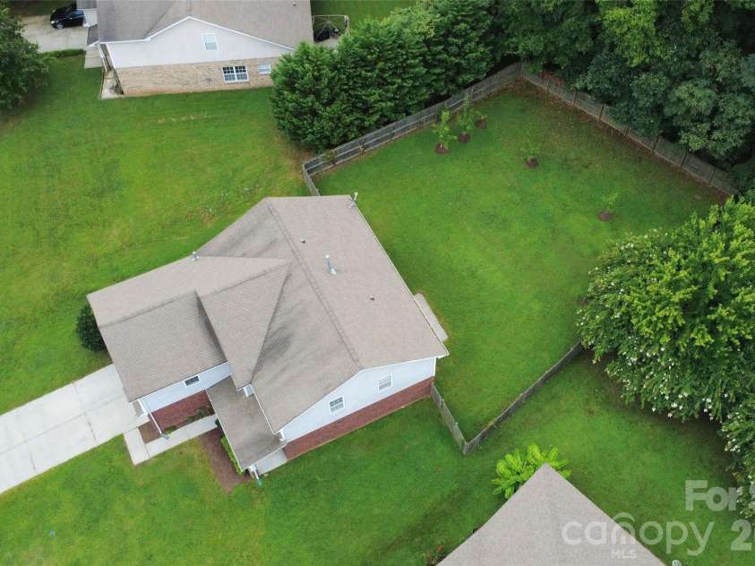 848 Estuary Court, Rock Hill, SC 29732.  MLS# CAR4411233, YatesRealty ID 42038. Situated on an oversized lot backing up to a 50-foot permanent wooded buffer with zero direct rear neighbors