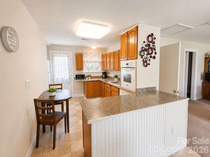 907 Sikes Mill Road, Monroe, NC 28110.  MLS# CAR4412371, YatesRealty ID 42048. Photo Enhanced