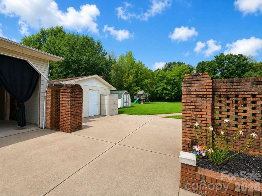 907 Sikes Mill Road, Monroe, NC 28110.  MLS# CAR4412371, YatesRealty ID 42048. Photo Enhanced