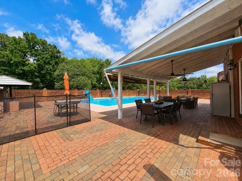 907 Sikes Mill Road, Monroe, NC 28110.  MLS# CAR4412371, YatesRealty ID 42048. Photo Enhanced