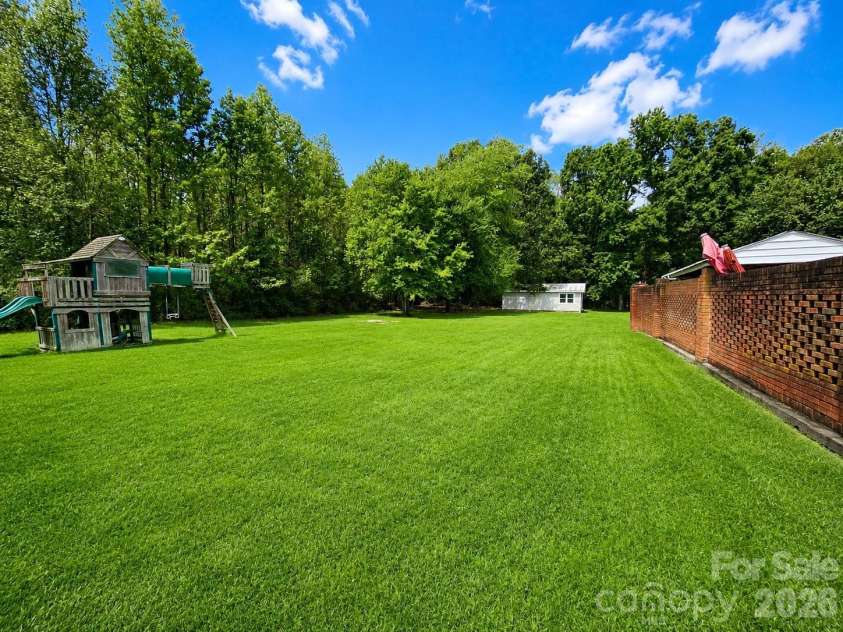 907 Sikes Mill Road, Monroe, NC 28110.  MLS# CAR4412371, YatesRealty ID 42048. Photo Enhanced