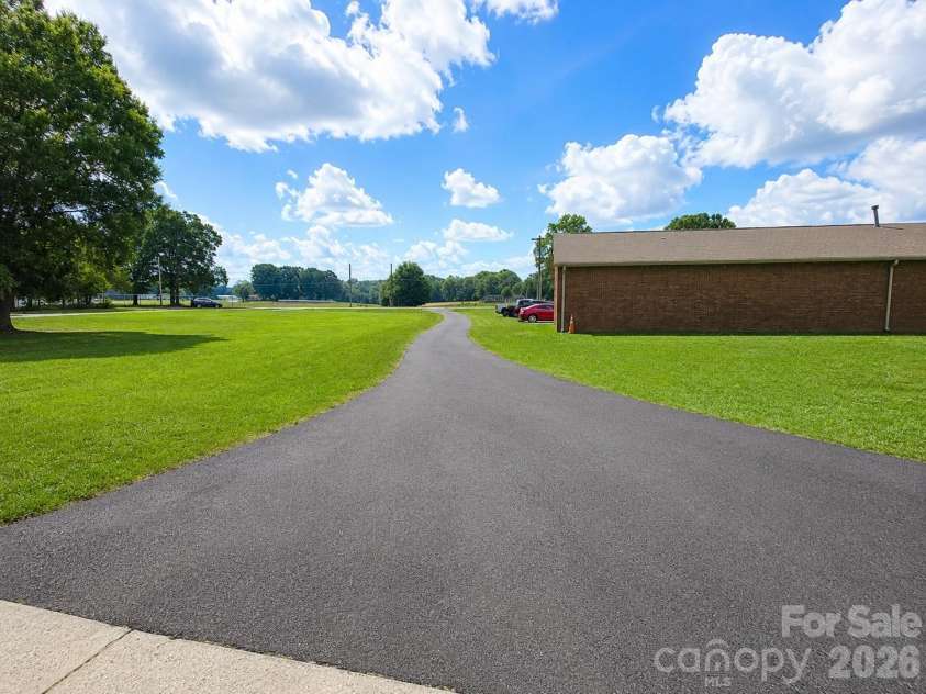 907 Sikes Mill Road, Monroe, NC 28110.  MLS# CAR4412371, YatesRealty ID 42048. Photo Enhanced