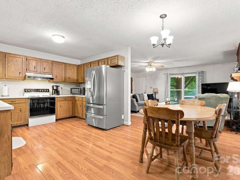 213 Hamilton Road, Troutman, NC 28166.  MLS# CAR4405468, YatesRealty ID 42054. Large kitchen with ample counter space and cabinets