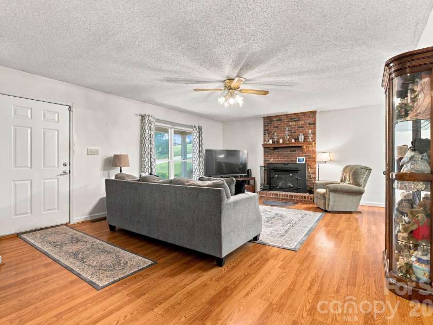 213 Hamilton Road, Troutman, NC 28166.  MLS# CAR4405468, YatesRealty ID 42054. Large open living room