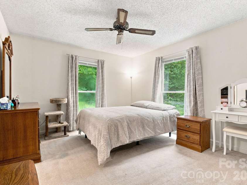 213 Hamilton Road, Troutman, NC 28166.  MLS# CAR4405468, YatesRealty ID 42054. Master bedroom