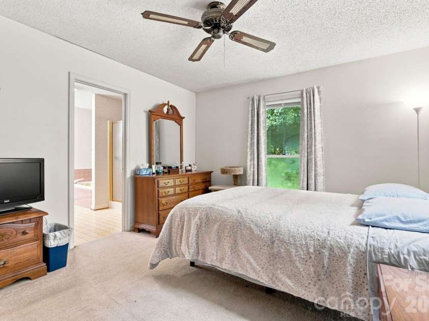 213 Hamilton Road, Troutman, NC 28166.  MLS# CAR4405468, YatesRealty ID 42054. Master bedroom