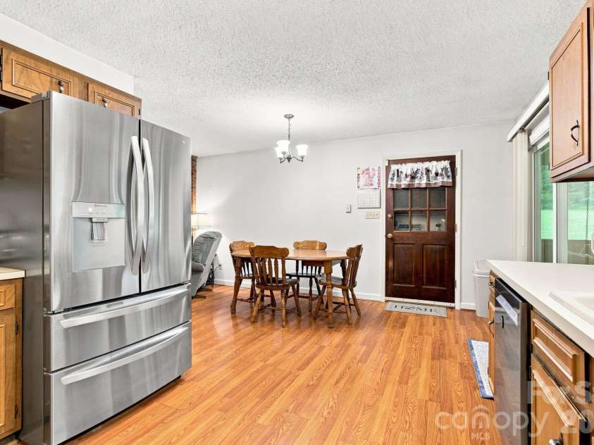 213 Hamilton Road, Troutman, NC 28166.  MLS# CAR4405468, YatesRealty ID 42054. Newer dishwasher and refrigerator