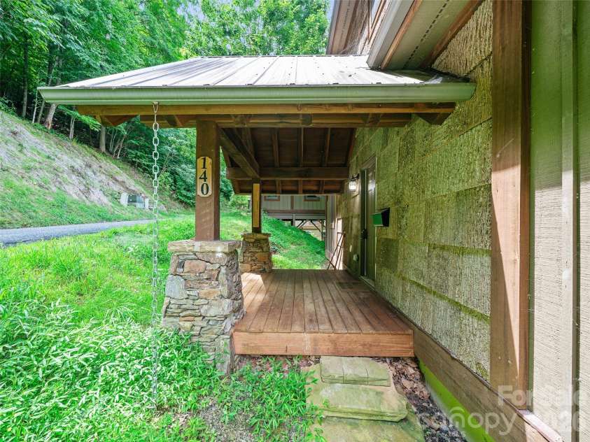 140 Falls Crossing Road, Burnsville, NC 28714.  MLS# CAR4393426, YatesRealty ID 42055. EASY LEVEL ACCESS
