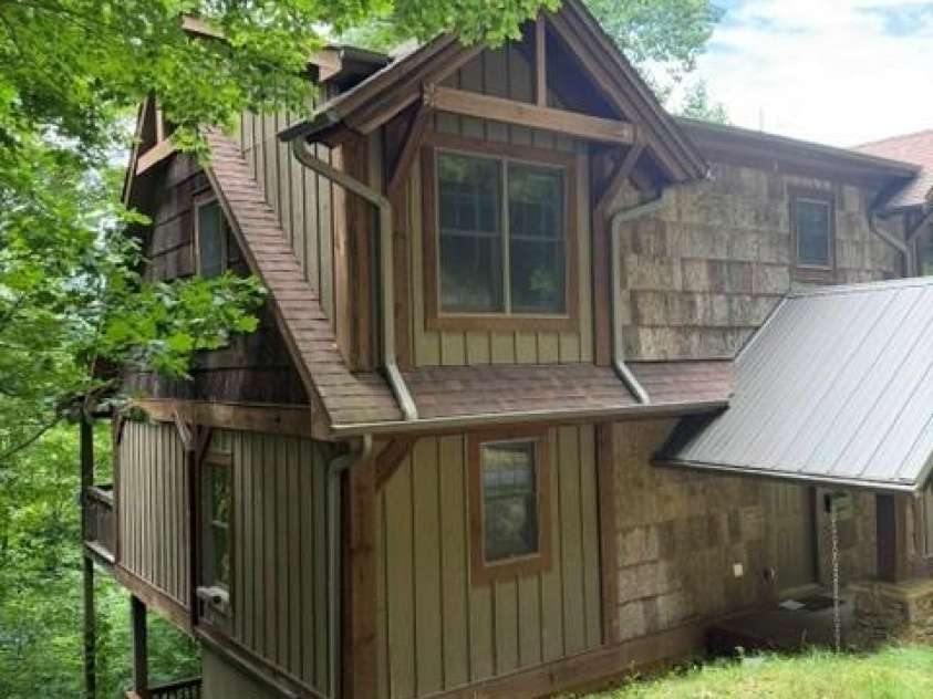 140 Falls Crossing Road, Burnsville, NC 28714.  MLS# CAR4393426, YatesRealty ID 42055. LEFT SIDE VIEW