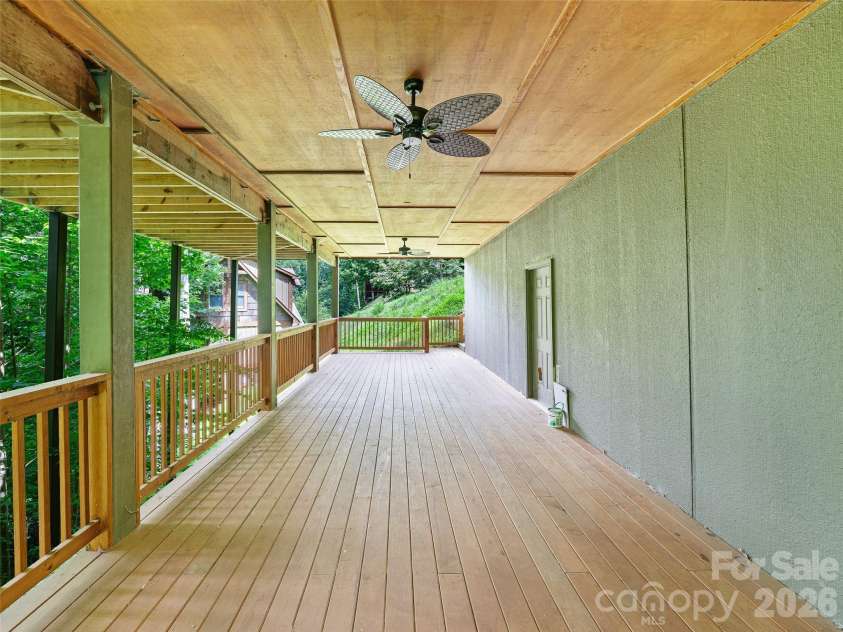 140 Falls Crossing Road, Burnsville, NC 28714.  MLS# CAR4393426, YatesRealty ID 42055. LOWER-LEVEL DECK