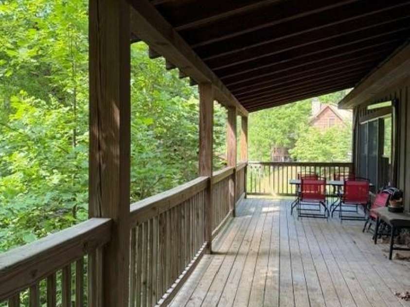 140 Falls Crossing Road, Burnsville, NC 28714.  MLS# CAR4393426, YatesRealty ID 42055. MAIN - COVERED DECK