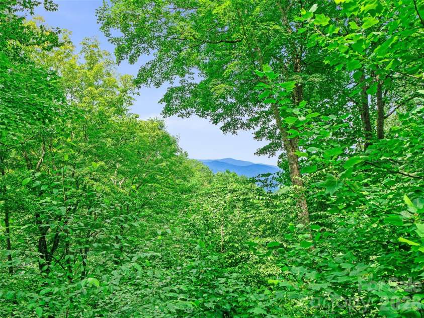 140 Falls Crossing Road, Burnsville, NC 28714.  MLS# CAR4393426, YatesRealty ID 42055. MOUNTAIN VIEW CORRIDOR - CAN BE EXPANDED!