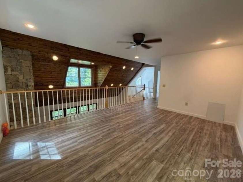 140 Falls Crossing Road, Burnsville, NC 28714.  MLS# CAR4393426, YatesRealty ID 42055. SPACIOUS LOFT