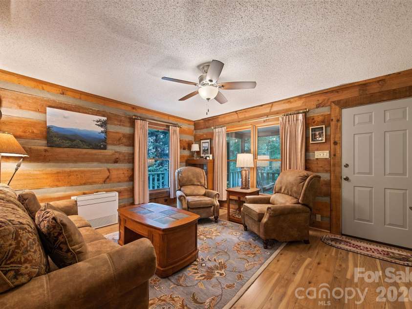 294 Laurel Branch Road, Maggie Valley, NC 28751.  MLS# CAR4411437, YatesRealty ID 42056. Open living room