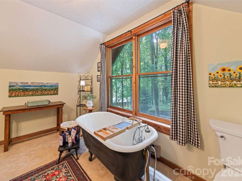294 Laurel Branch Road, Maggie Valley, NC 28751.  MLS# CAR4411437, YatesRealty ID 42056. Soaking tub