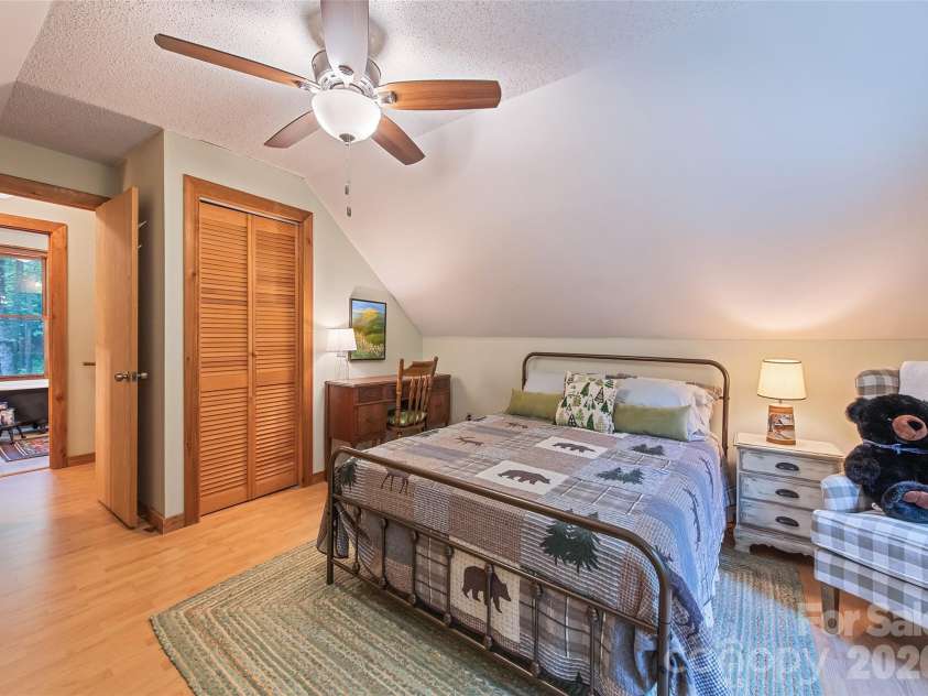 294 Laurel Branch Road, Maggie Valley, NC 28751.  MLS# CAR4411437, YatesRealty ID 42056. Upper floor bedroom