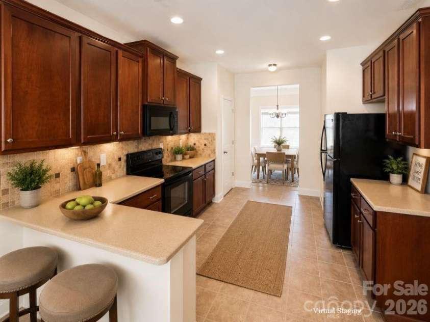 2304 Bonterra Boulevard, Indian Trail, NC 28079.  MLS# CAR4406663, YatesRealty ID 42062. Staged Kitchen