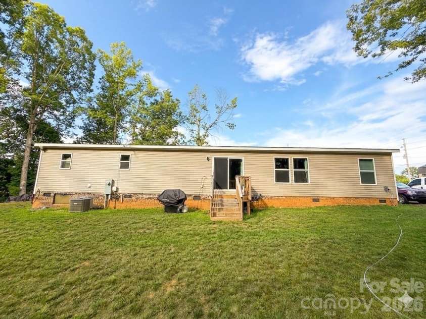 5351 Walter Lowman Road, Connelly Springs, NC 28612.  MLS# CAR4402109, YatesRealty ID 42064. Backyard