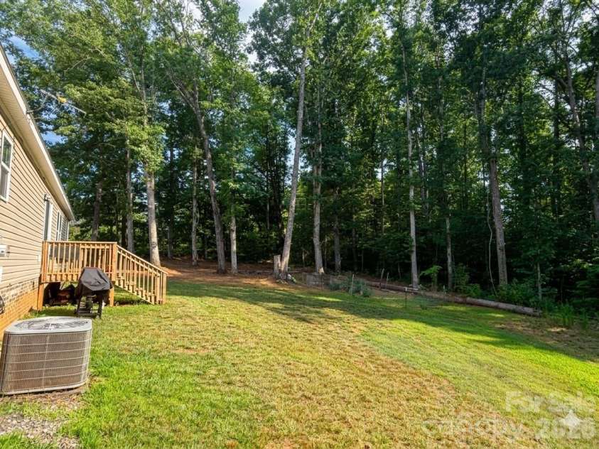 5351 Walter Lowman Road, Connelly Springs, NC 28612.  MLS# CAR4402109, YatesRealty ID 42064. Side Yard