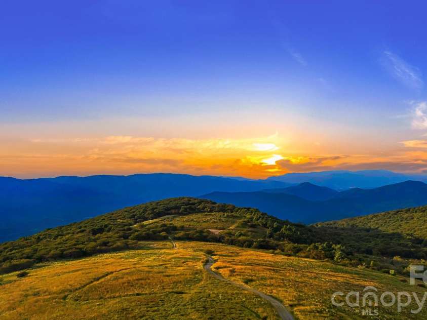 817 Running Cedar Lane, Mars Hill, NC 28754.  MLS# CAR4407984, YatesRealty ID 42073. Big Bald Sunsets