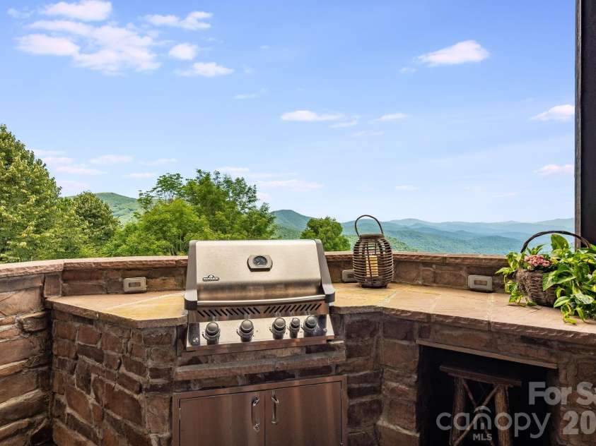 817 Running Cedar Lane, Mars Hill, NC 28754.  MLS# CAR4407984, YatesRealty ID 42073. Built-in grill overlooking the mountains