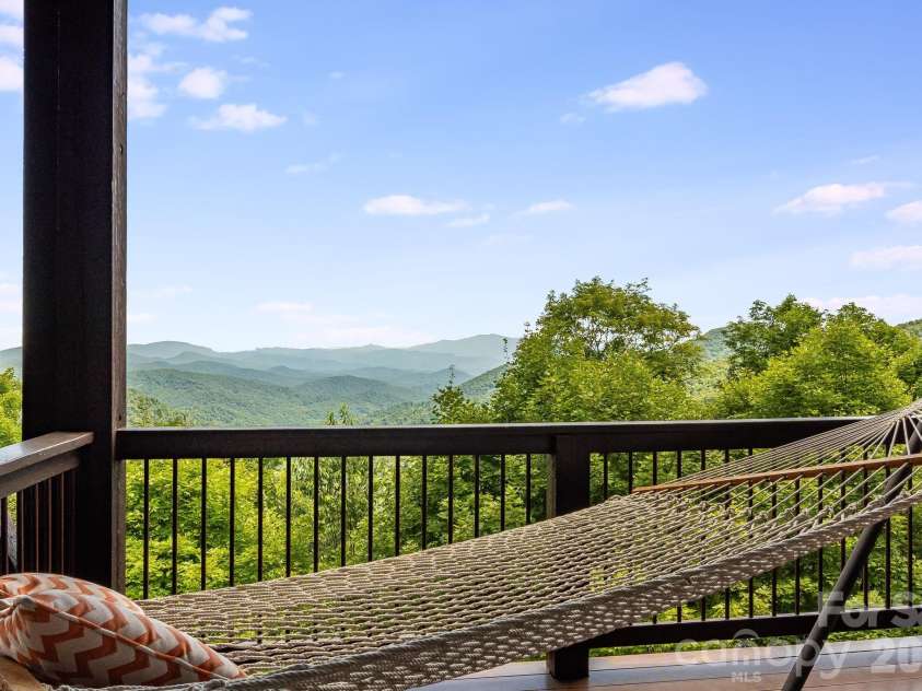 817 Running Cedar Lane, Mars Hill, NC 28754.  MLS# CAR4407984, YatesRealty ID 42073. Hammock relaxation with a mountain backdrop
