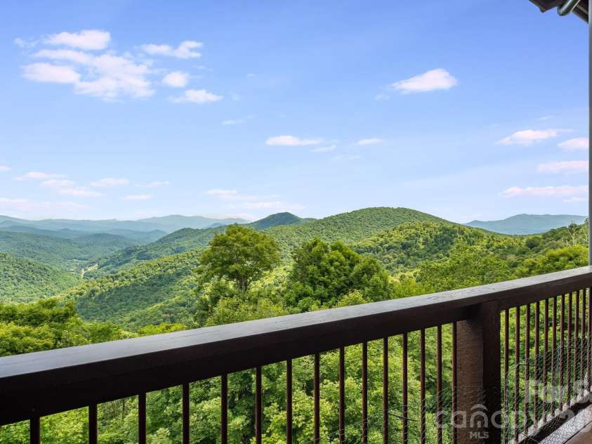 817 Running Cedar Lane, Mars Hill, NC 28754.  MLS# CAR4407984, YatesRealty ID 42073. Lower level covered deck.