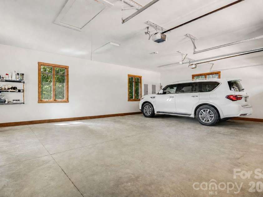 817 Running Cedar Lane, Mars Hill, NC 28754.  MLS# CAR4407984, YatesRealty ID 42073. Two car garage with plently of extra storage space.