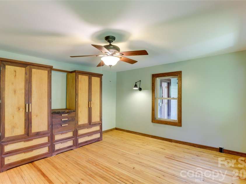 435 Mountain Cove Road, Marshall, NC 28753.  MLS# CAR4396478, YatesRealty ID 42077. Primary bedroom on the main level
