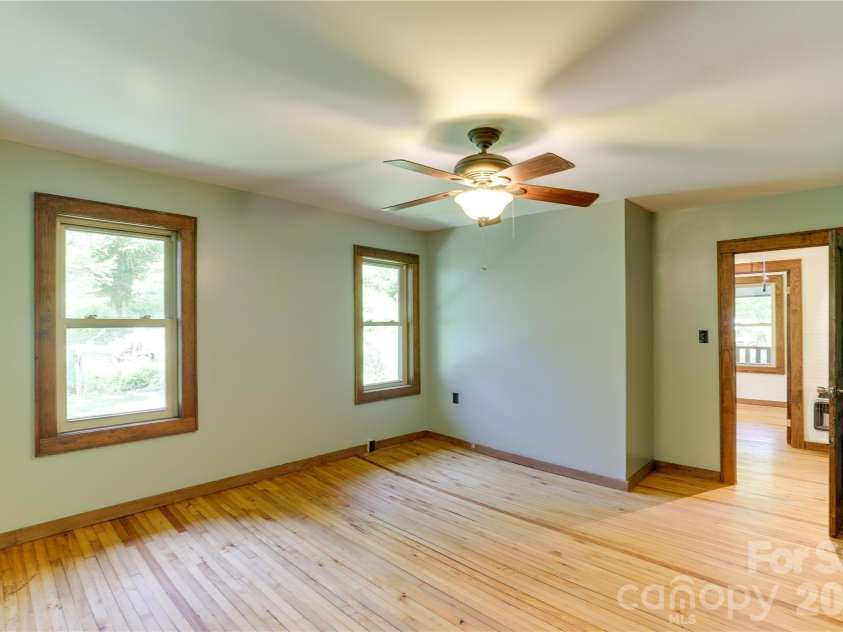 435 Mountain Cove Road, Marshall, NC 28753.  MLS# CAR4396478, YatesRealty ID 42077. Spacious primary bedroom
