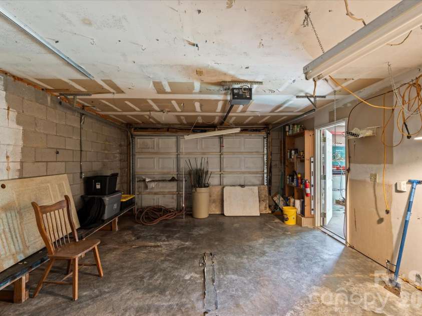 4080 East Fork Road, Marshall, NC 28753.  MLS# CAR4340497, YatesRealty ID 4208. Remove the add-on in front of garage door for bsmt parking