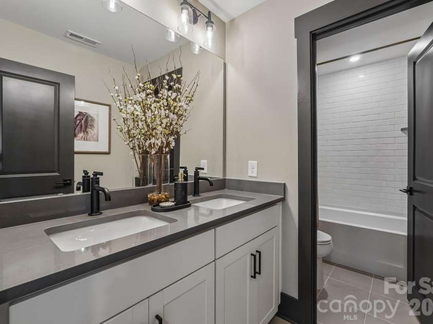 3025 Grandiose Drive, Indian Trail, NC 28079.  MLS# CAR4410750, YatesRealty ID 42081. Second Floor Shared Bath - Model Home Photo for Reference Only.