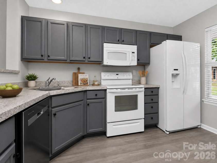 10866 Holly Ridge Boulevard, Charlotte, NC 28216.  MLS# CAR4401708, YatesRealty ID 42090. Virtually Staged