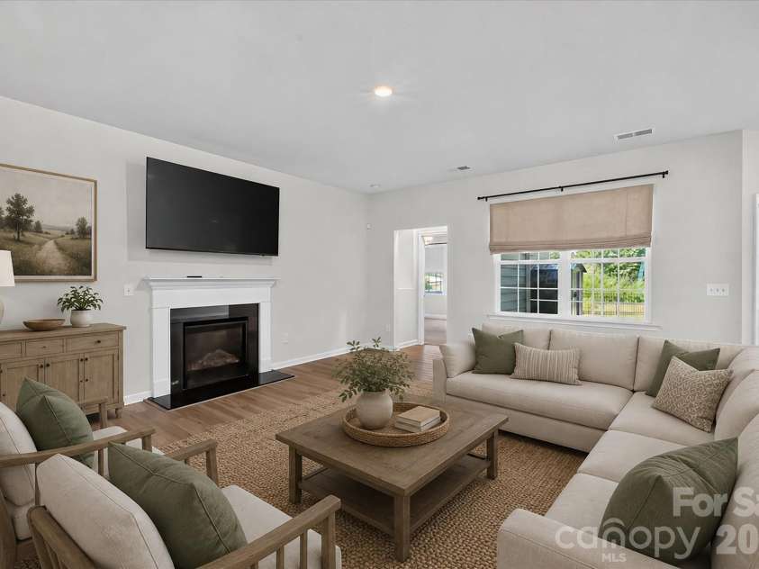 14016 Southbridge Forest Drive, Charlotte, NC 28273.  MLS# CAR4404050, YatesRealty ID 42102. Family Room Virtually Staged