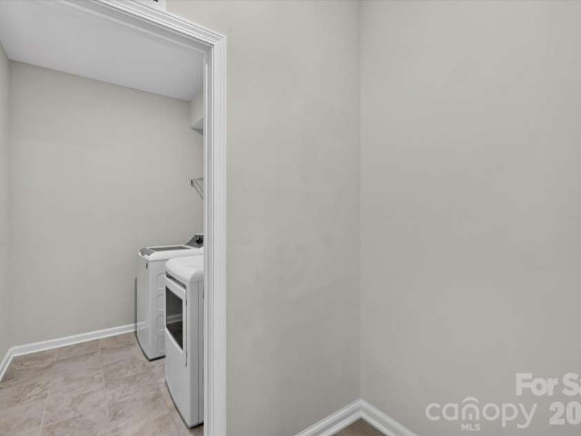 14016 Southbridge Forest Drive, Charlotte, NC 28273.  MLS# CAR4404050, YatesRealty ID 42102. First Floor Laundry with Niche for Future Drop Zone