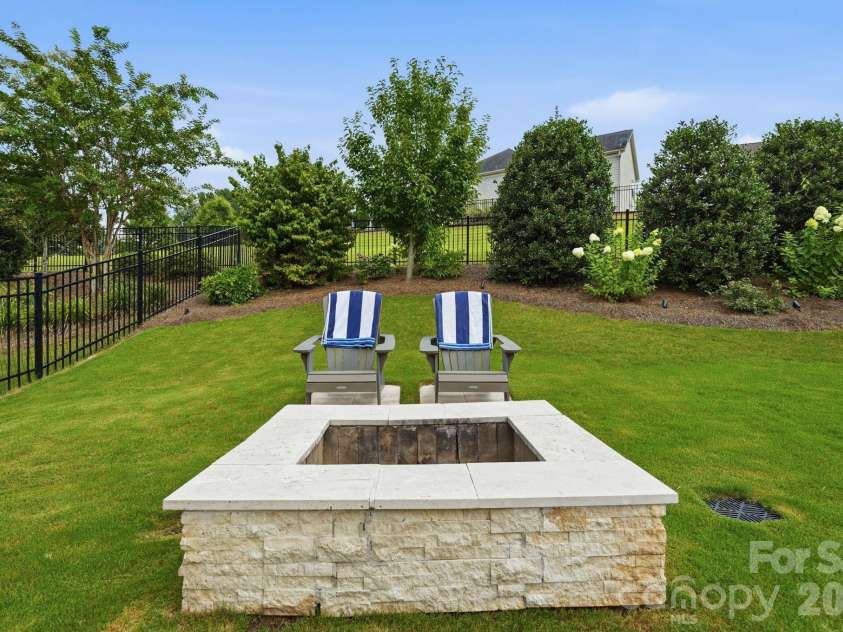 109 Heron Cove Loop, Mooresville, NC 28117.  MLS# CAR4406863, YatesRealty ID 42104. Fire pit