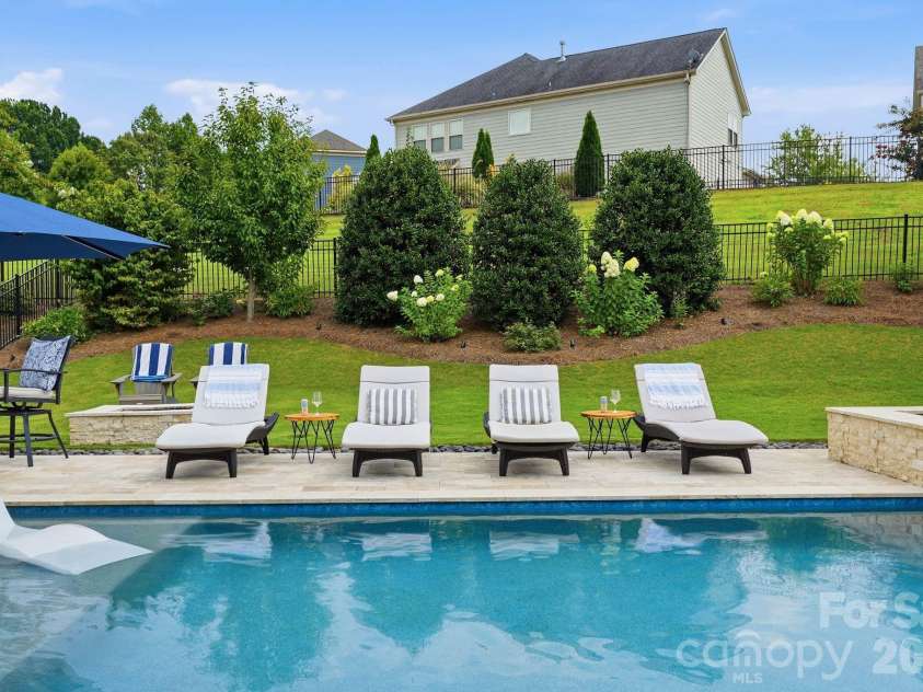 109 Heron Cove Loop, Mooresville, NC 28117.  MLS# CAR4406863, YatesRealty ID 42104. Refreshing Salt Water Pool & Spa