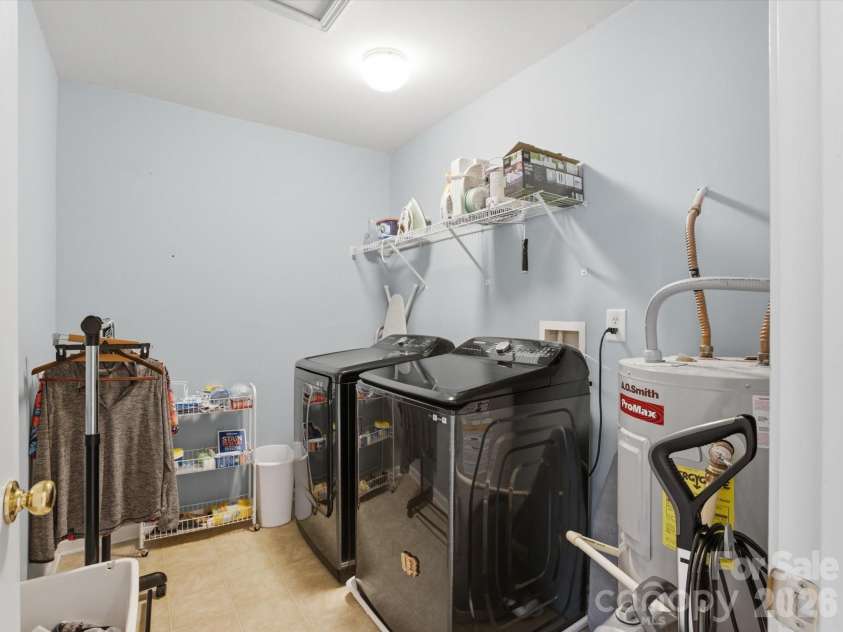 209 Tail Race Lane, Fort Mill, SC 29715.  MLS# CAR4408718, YatesRealty ID 42106. Large Laundry Room