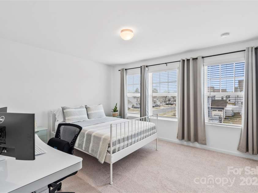 5104 Thomasville Drive, Belmont, NC 28012.  MLS# CAR4242636, YatesRealty ID 4211. Bedroom 2 with lots of space and light throughout