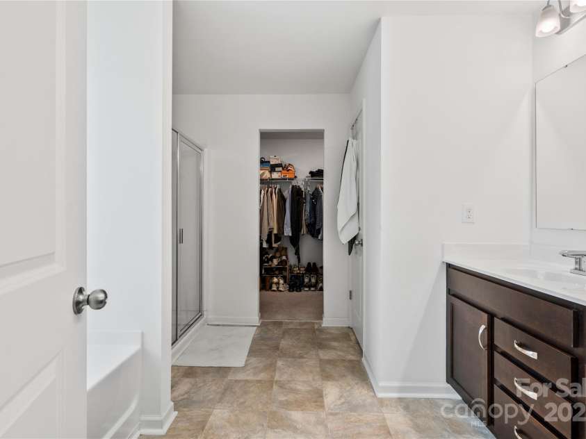 5104 Thomasville Drive, Belmont, NC 28012.  MLS# CAR4242636, YatesRealty ID 4211. Primary bathroom looking into closet