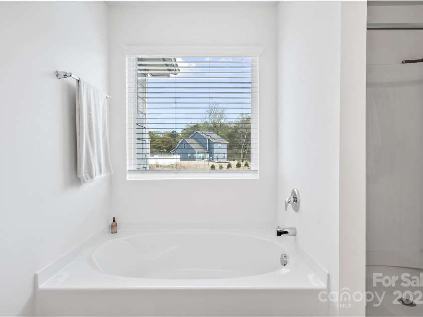 5104 Thomasville Drive, Belmont, NC 28012.  MLS# CAR4242636, YatesRealty ID 4211. Time to soak away your worries!