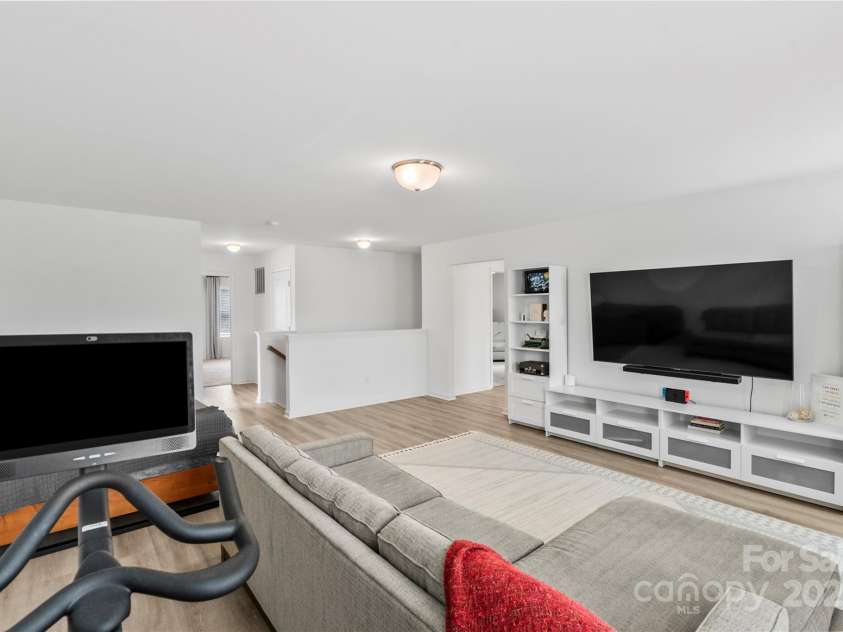 5104 Thomasville Drive, Belmont, NC 28012.  MLS# CAR4242636, YatesRealty ID 4211. Use this for workouts, library or family space