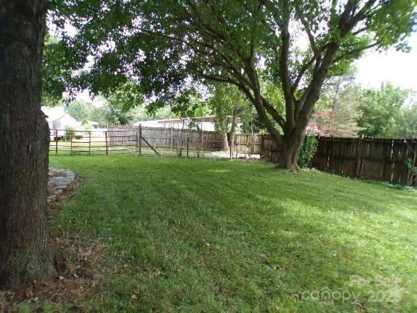 71 Flat Creek Road, Waynesville, NC 28785.  MLS# CAR4289223, YatesRealty ID 4211. Backyard