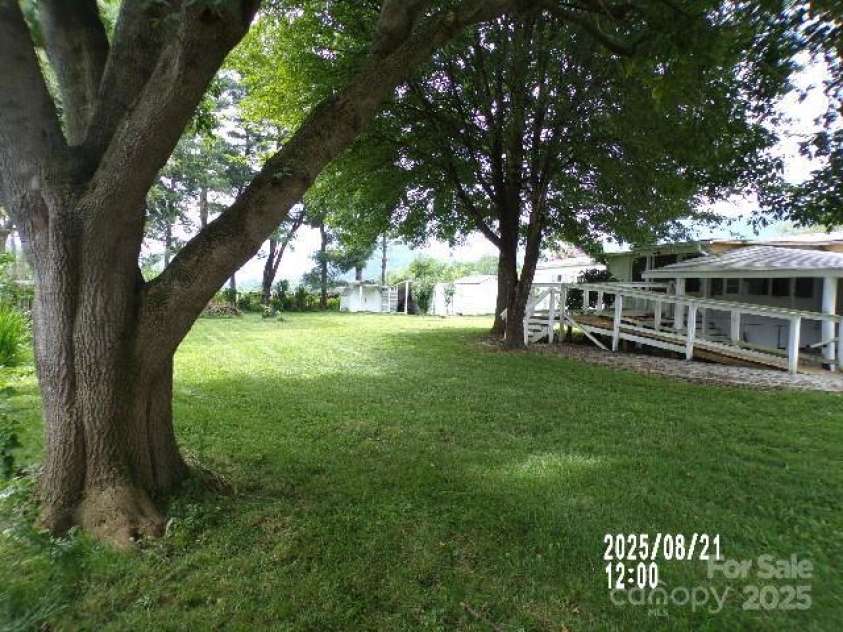 71 Flat Creek Road, Waynesville, NC 28785.  MLS# CAR4289223, YatesRealty ID 4211. Backyard
