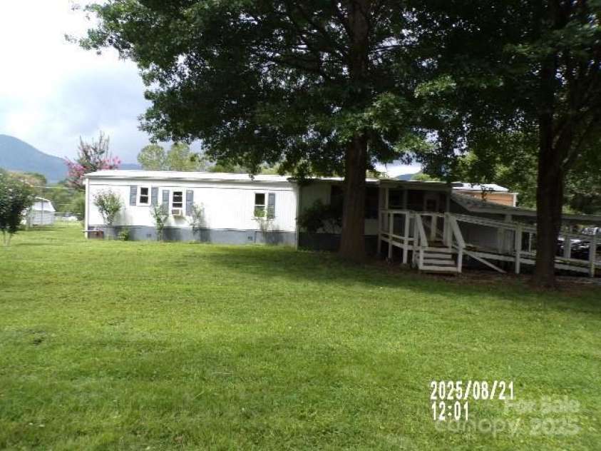 71 Flat Creek Road, Waynesville, NC 28785.  MLS# CAR4289223, YatesRealty ID 4211. Backyard