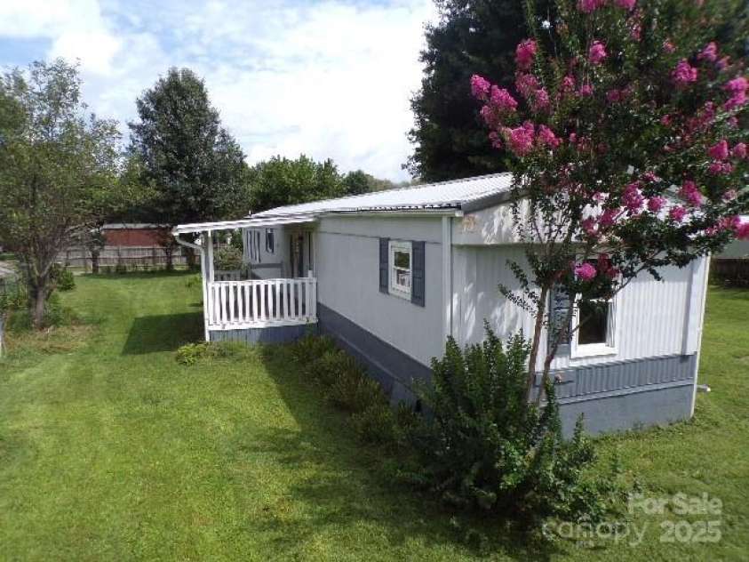 71 Flat Creek Road, Waynesville, NC 28785.  MLS# CAR4289223, YatesRealty ID 4211. Front side view