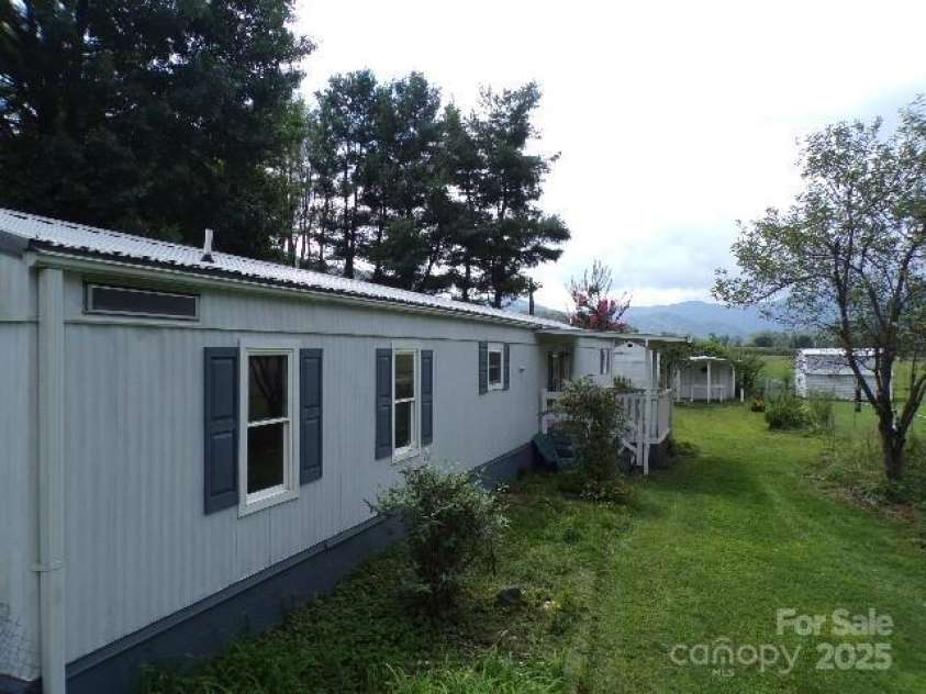71 Flat Creek Road, Waynesville, NC 28785.  MLS# CAR4289223, YatesRealty ID 4211. Front view