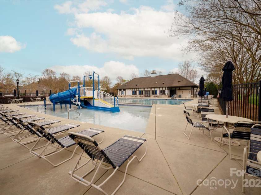 11308 Wheat Ridge Road, Charlotte, NC 28277.  MLS# CAR4241331, YatesRealty ID 4212. Community pool w/ play area just steps from the front door